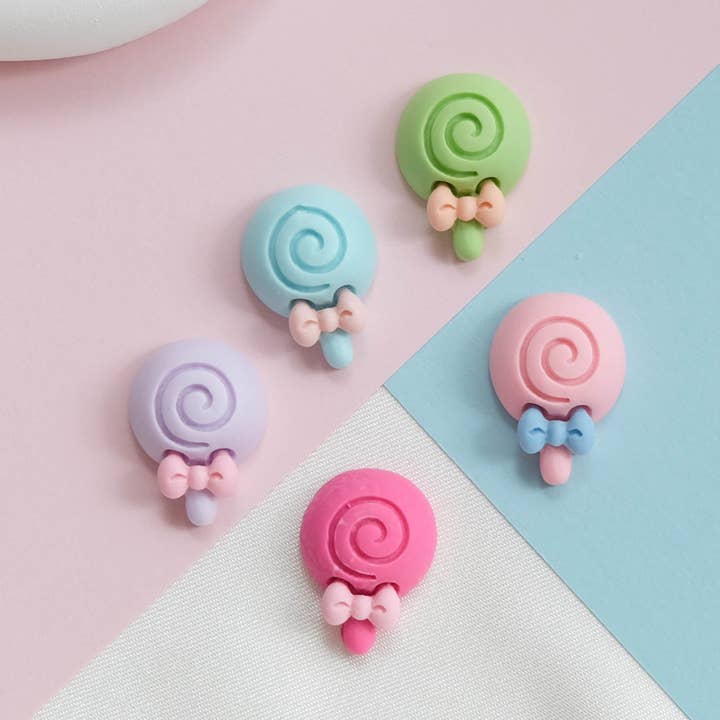 Random pcs Macaron Lollipops for wholesale on Faire0