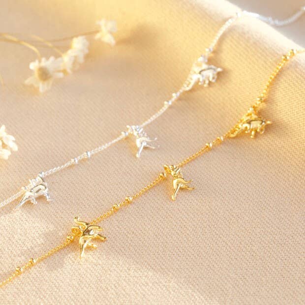 Collier à breloques dinosaures pour la vente par Lisa Angel