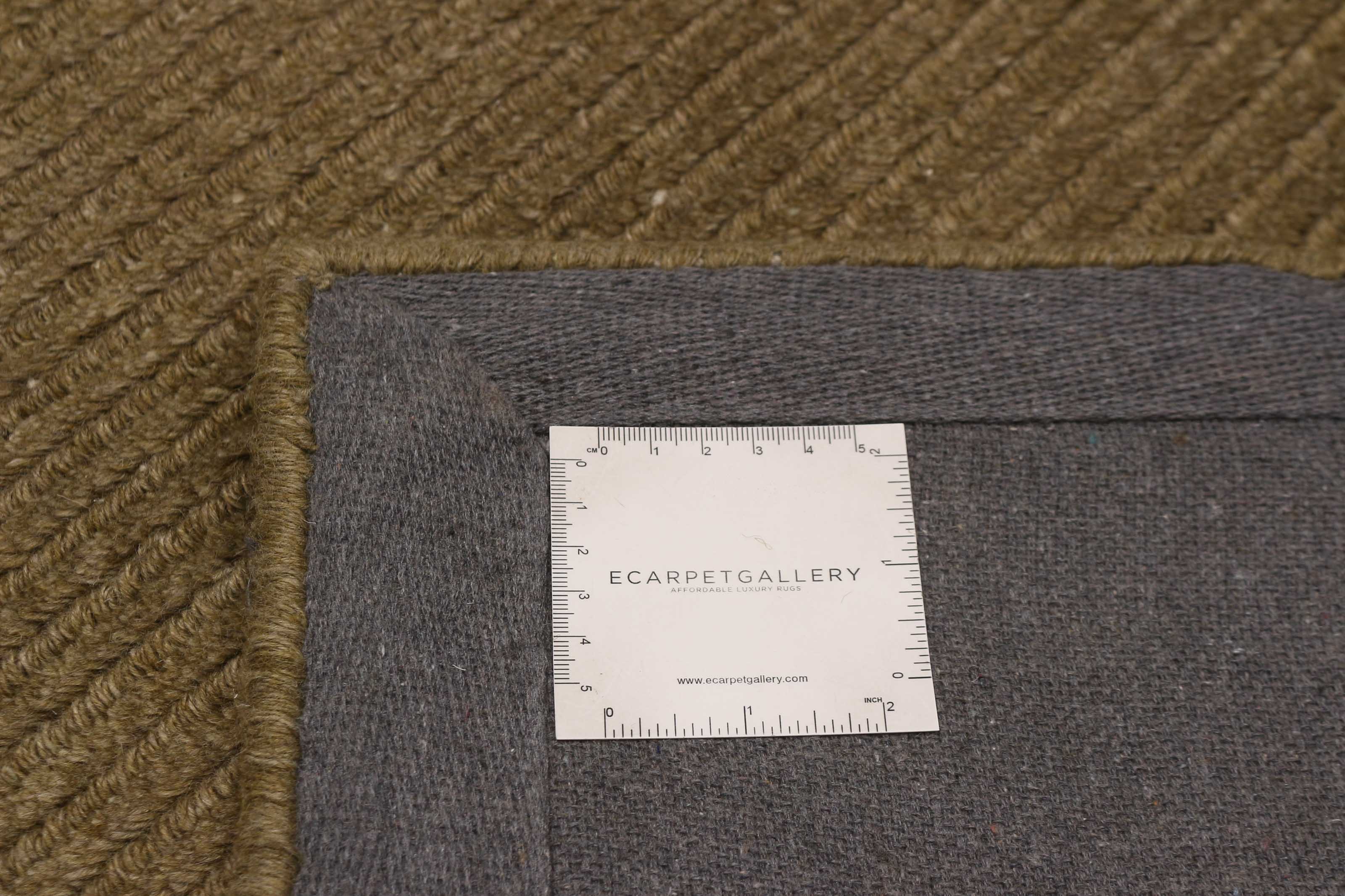 Rio Olive Area Rug for wholesale on Faire17