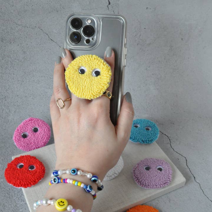 TheMellys - Vendita all'ingrosso Impugnatura per smartphone - Presa pop Googly Eyes trapuntata a mano1