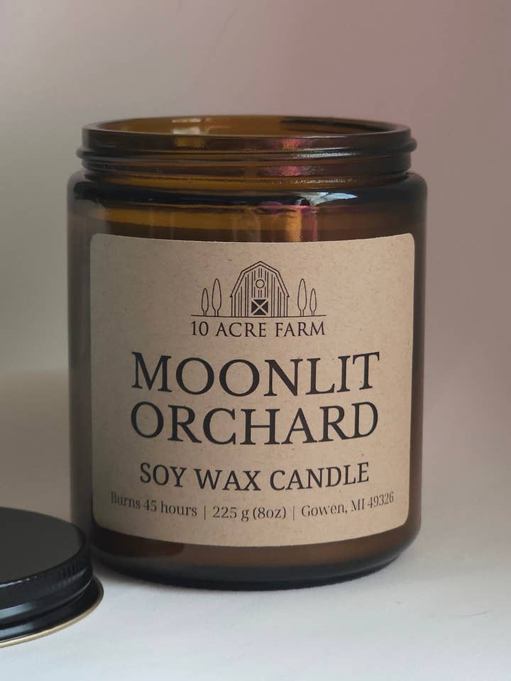 Moonlit Orchard 8oz Soy Amber Glass Fall Candle for wholesale by 10 acre farm