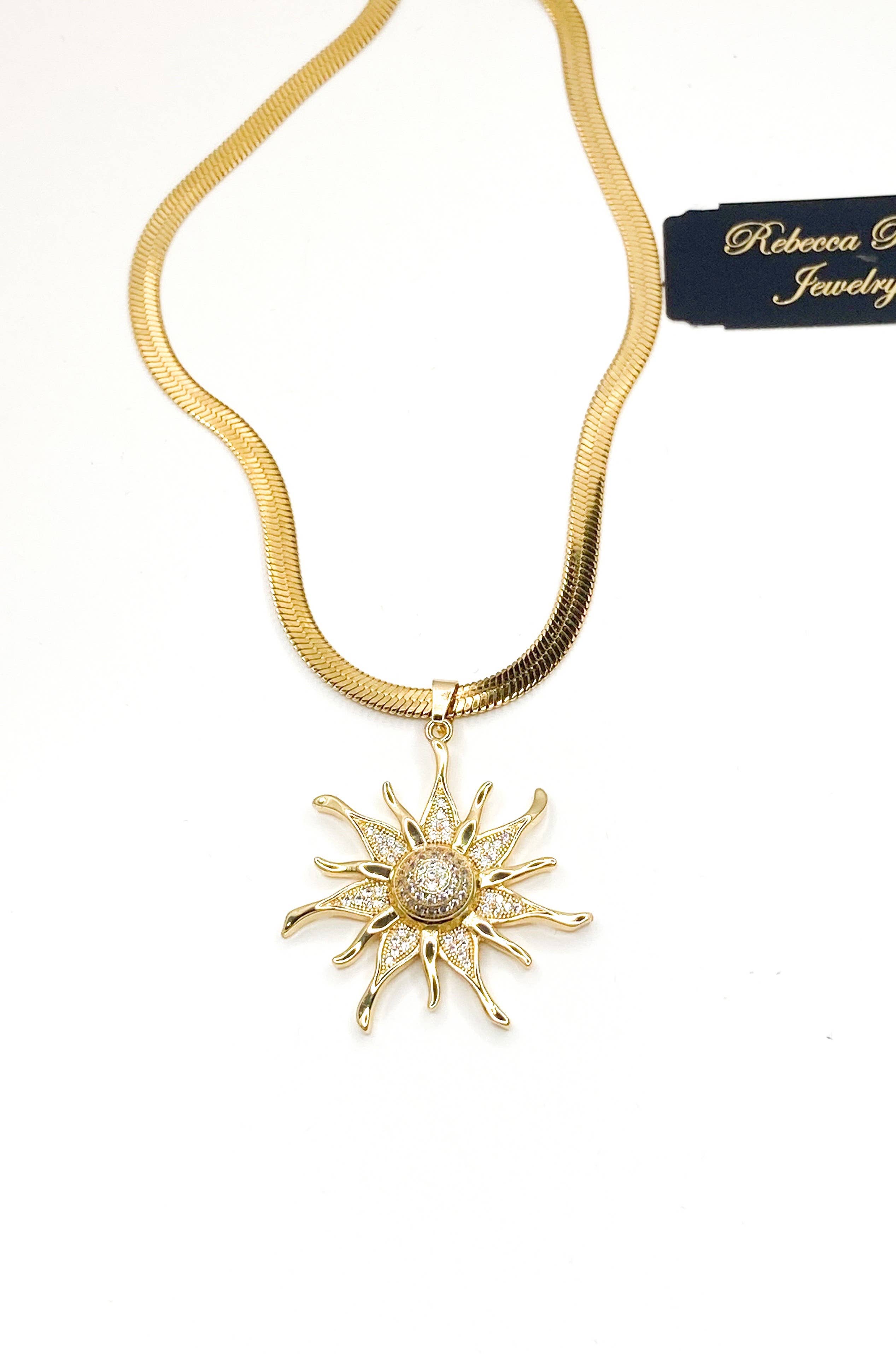 Rebecca Ray Jewelry - Wholesale Pendant/Charm Necklace - Gold Herringbone Necklace with Crystal Sun Celestial Pendant2
