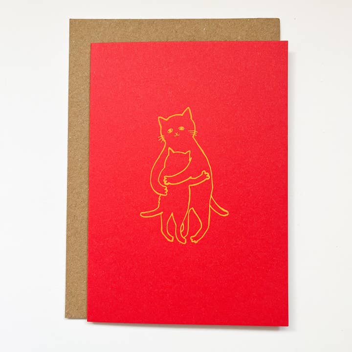 Hug - hand foil block printed greeting card on recycled paper for wholesale by Takako Copeland