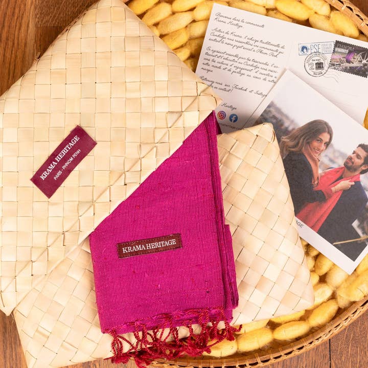 Krama Heritage - Wholesale Scarf - Women's - The Textured Fuchsia Krama in its palm leaf case - Woman6