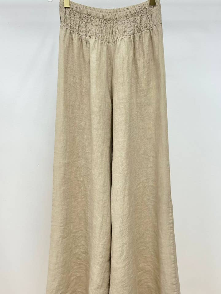 PANTALON LARGE À TAILLE SMOCKÉE EN LIN (155075-UNI) pour la vente par MILIO MILANO