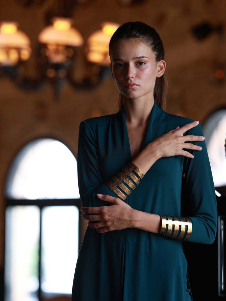 Pulseira Sol Dourado por atacado de Ecue