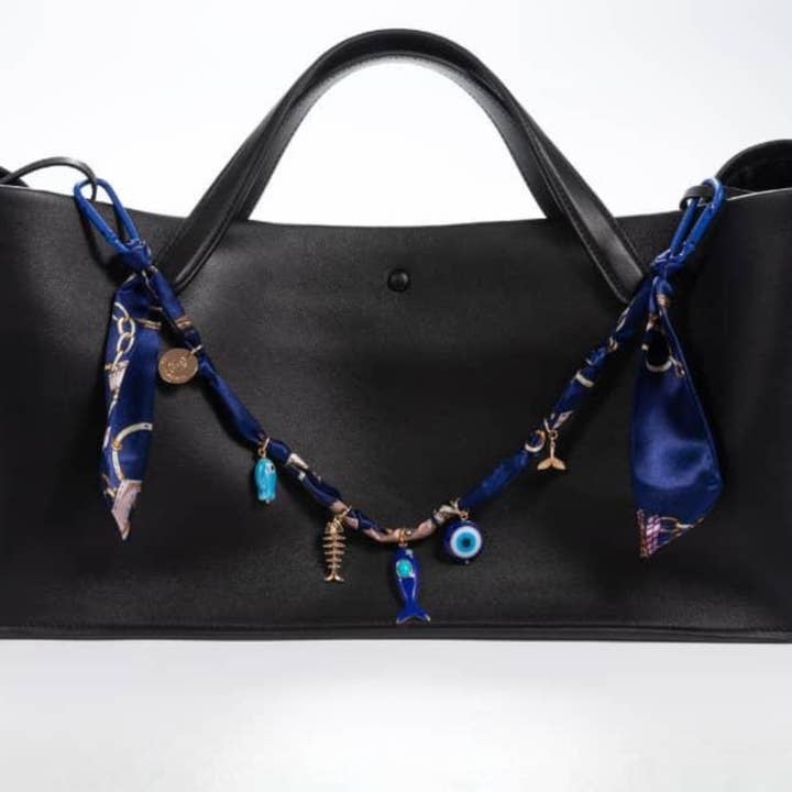 The Riviera Silk Bag Charm for wholesale by Miami Chains & Co.