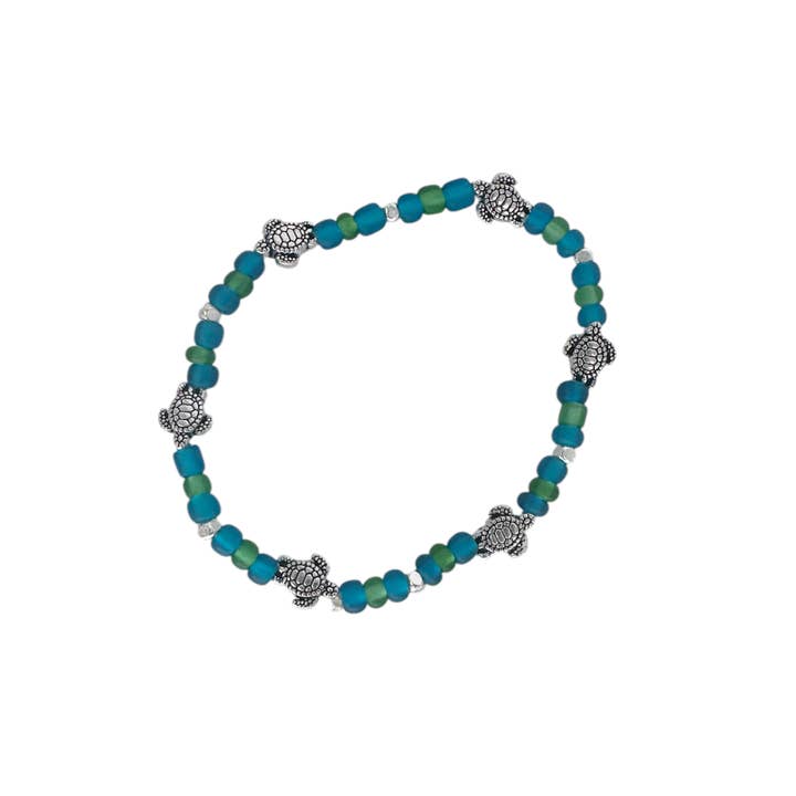 Confezione da 5 braccialetti elastici per bambini con perline blu, verdi e argento con tartarughe. per la vendita all'ingrosso da parte di Maka Imports