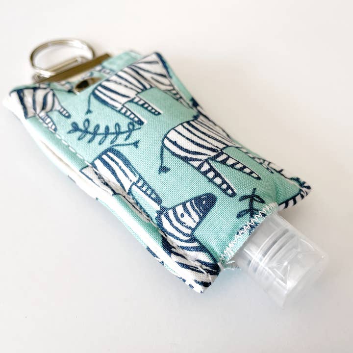 Kids Hand Sanitizer Hållare | Zebra Hand Sanitizer Nyckelring för wholesale av Crimson + Scarlett