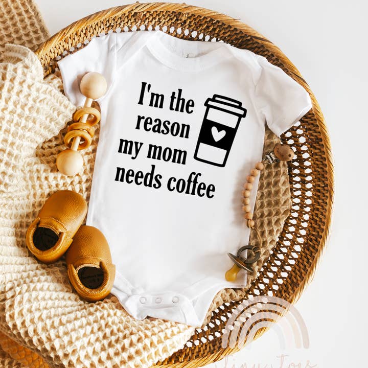 I'm The Reason My Mom Needs Coffee Funny Baby Bodysuit for wholesale by Tiny toes Baby Co