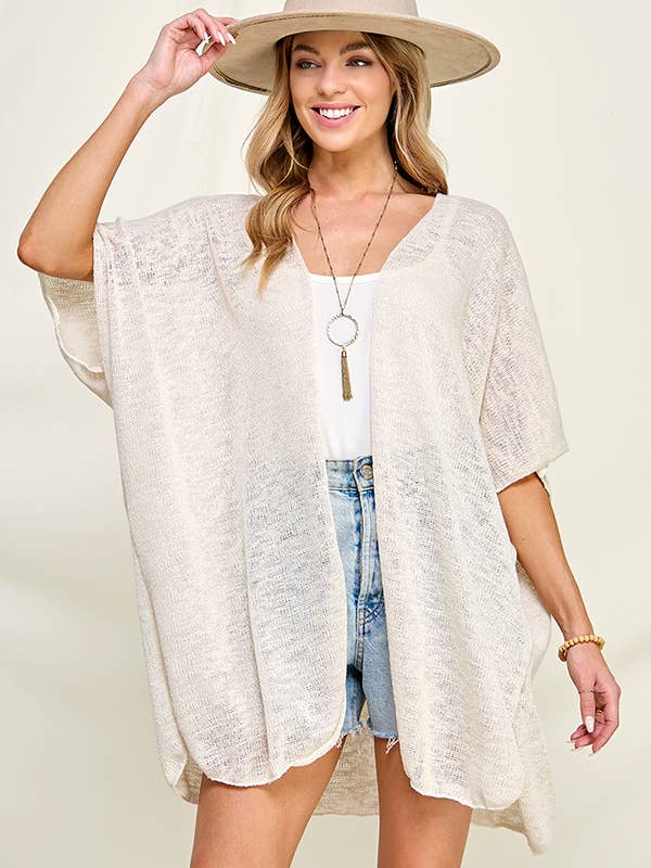 232072C - Cardigan uni pour femme pour la vente par Chris & Carol Apparel