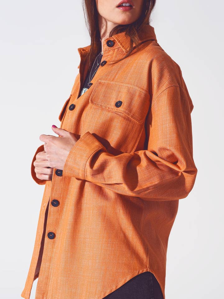 Long sleeve shacket in orange for wholesale by Q2 Free Duties for US & UK