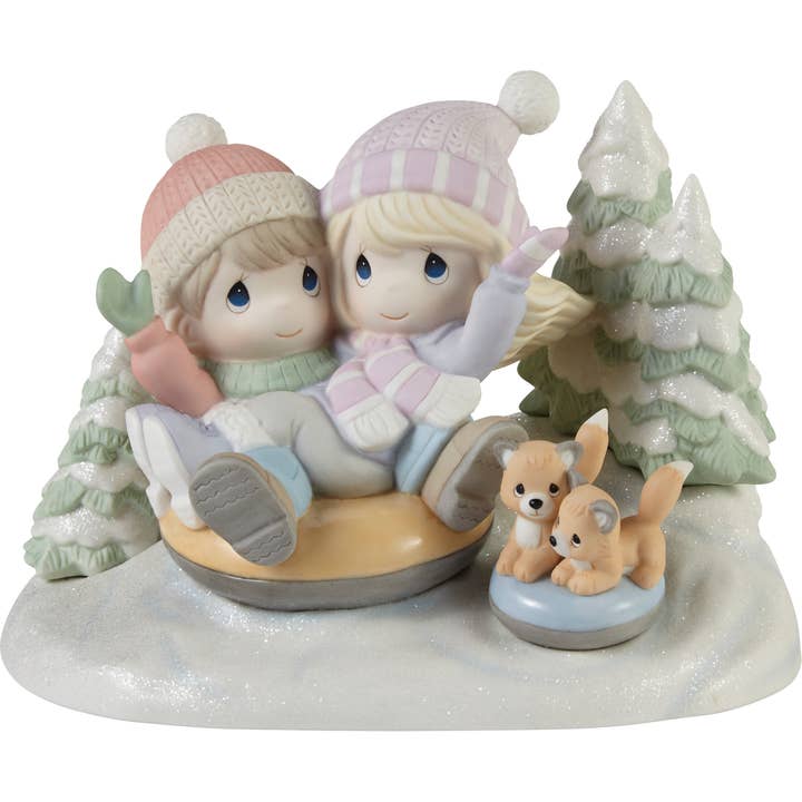 Precious Moments Ltd Ed Couple Snow Tubing Figurine for wholesale by Precious Moments