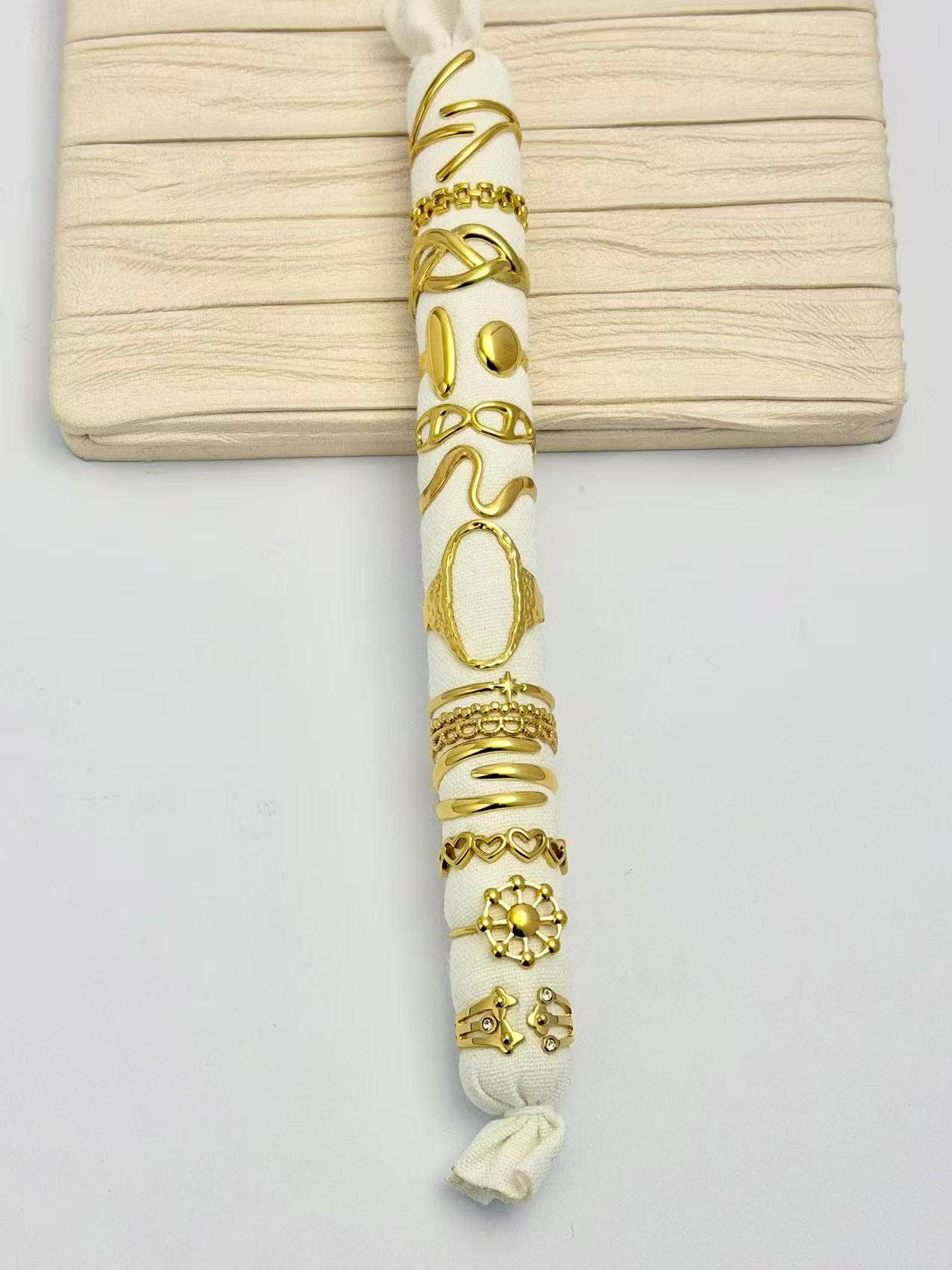 COSMOS - Wholesale Band/Stacked Ring - Set of 12 adjustable stainless steel rings with cushion included1