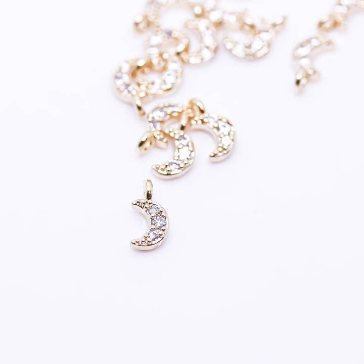 Dainty Gold/Silver CZ Moon Charm 5.5x4mm WHOLESALE CPG040 for wholesale by Jewel Pledge