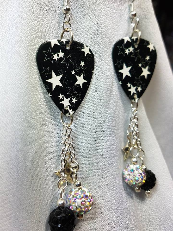 White Stars on Black Background Guitar Pick Earrings for wholesale by Simply Raevyn