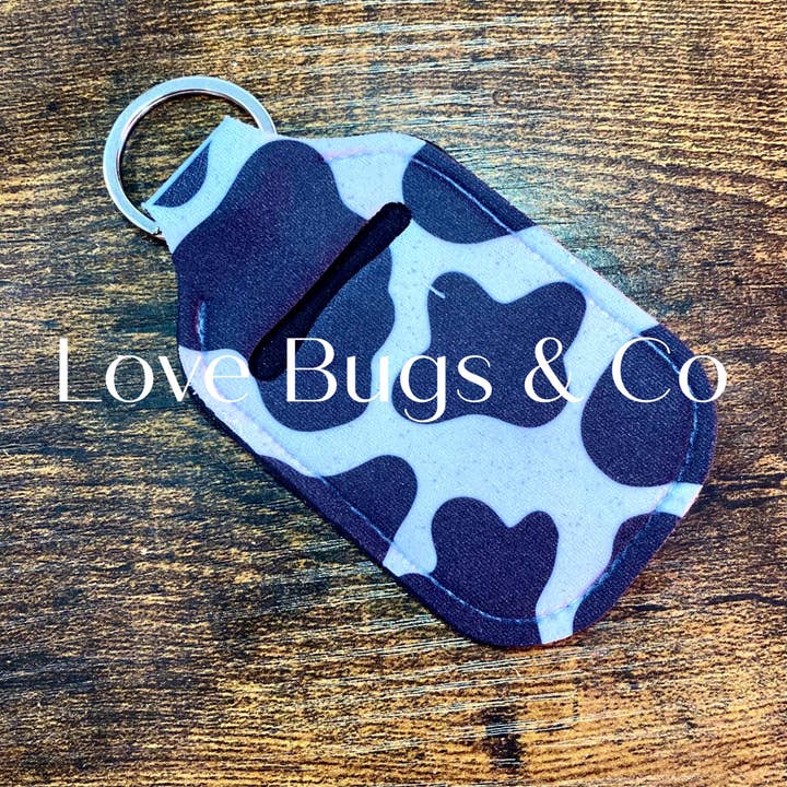 3 Cow Print Neoprene Hand Sanitizer Keychain for wholesale by LB & Co Wholesale