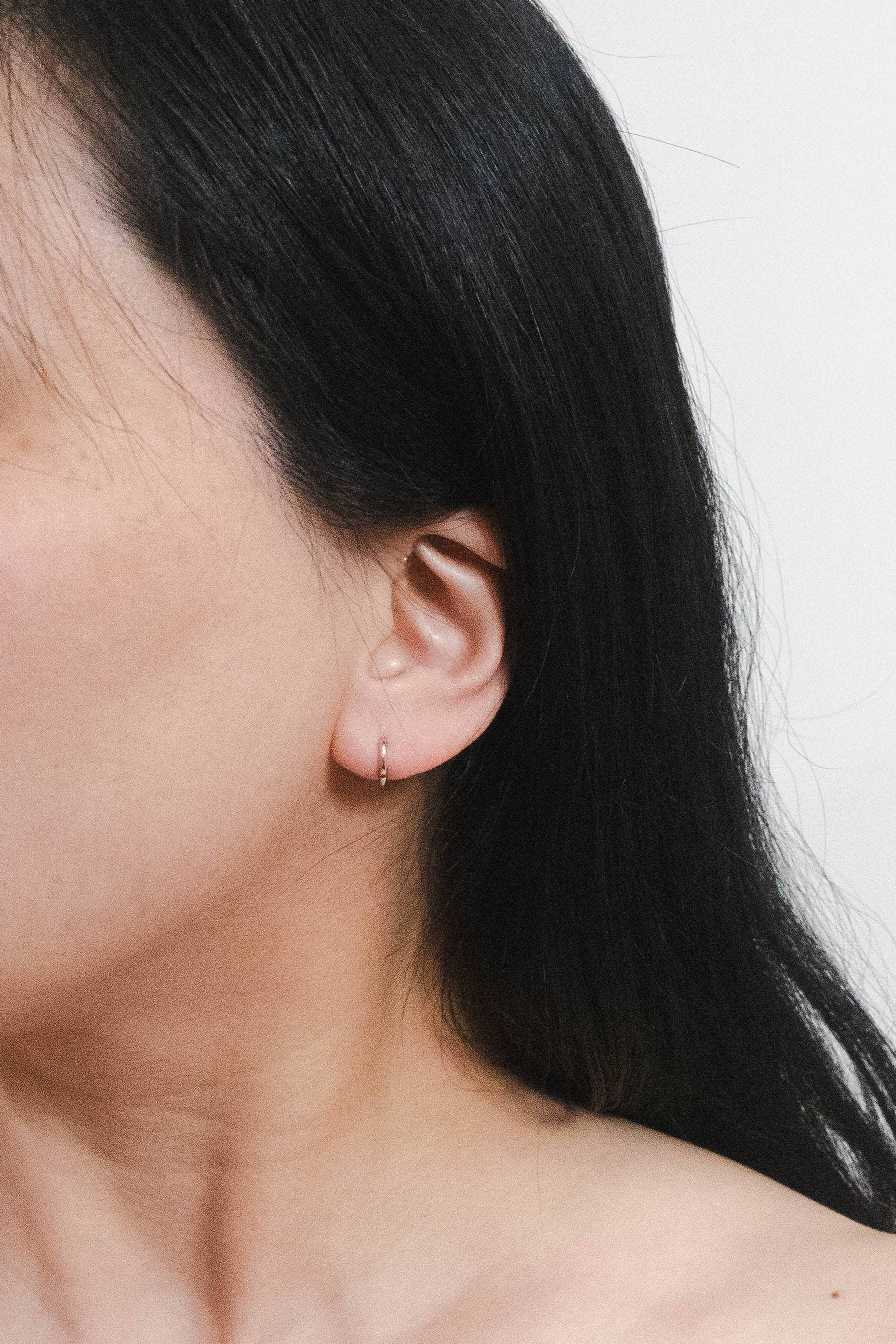 Lovoda - Wholesale Huggie Earrings - Ultra Mini Huggie Hoop Earrings | Silver1