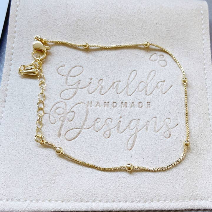 Bracelet en métal doré 24 carats avec cercles ronds pour la vente par Giralda Designs