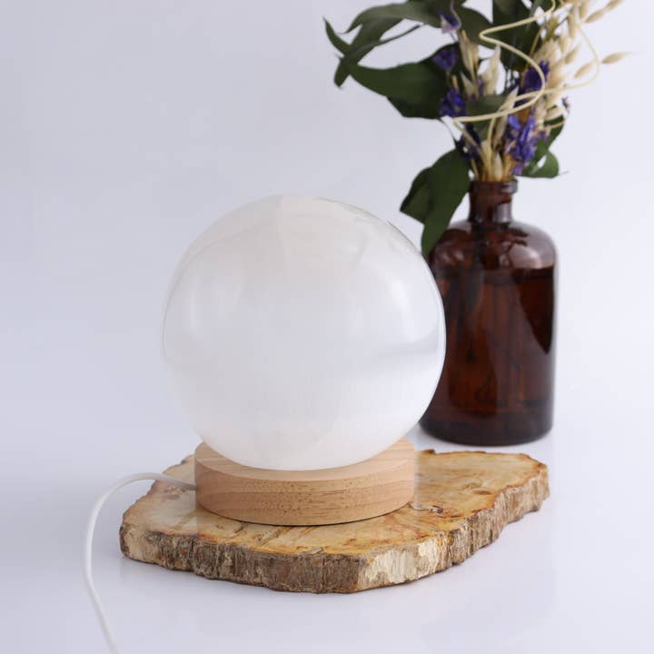 One Selenite (Satin Spar) Sphere Lamp with Light for wholesale by Mi Esperanza Minerals