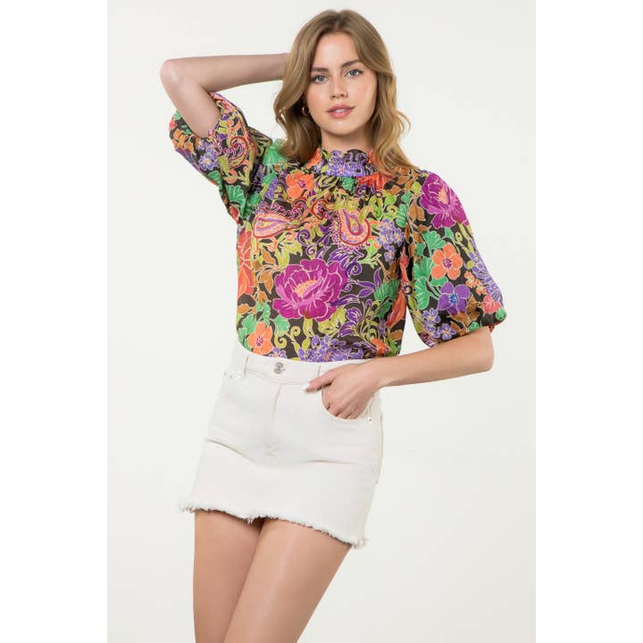 Haut à imprimé floral avec col à volants et manches bouffantes pour la vente par THML