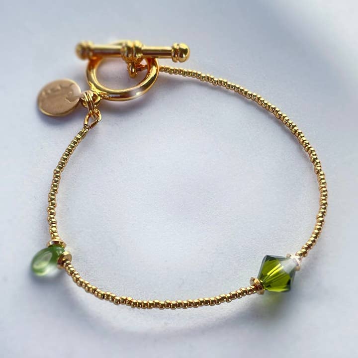 2021-A01-039 Bracciale Oro - Cristallo Verde Smeraldo per la vendita all'ingrosso da parte di Petite Marie Jewelry