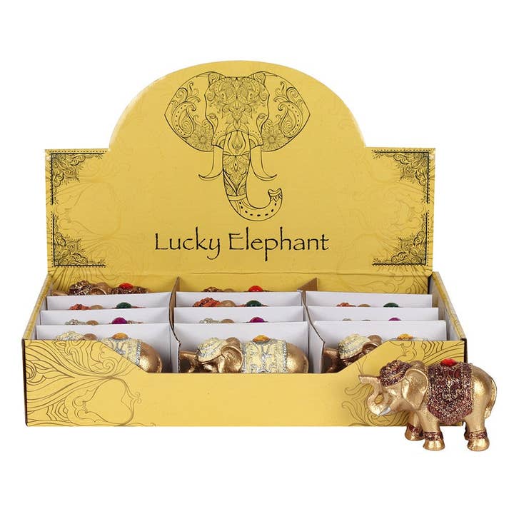 Ornement éléphant porte-bonheur en or dans un sac pour la vente par Something Different Wholesale
