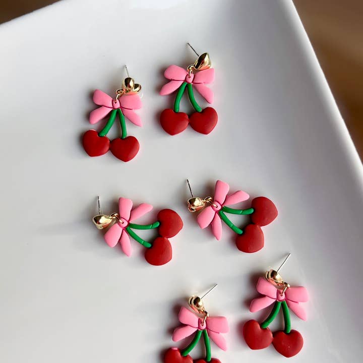 The Cherri | Cherry Bow Clay Earrings for wholesale by Cascade Designs