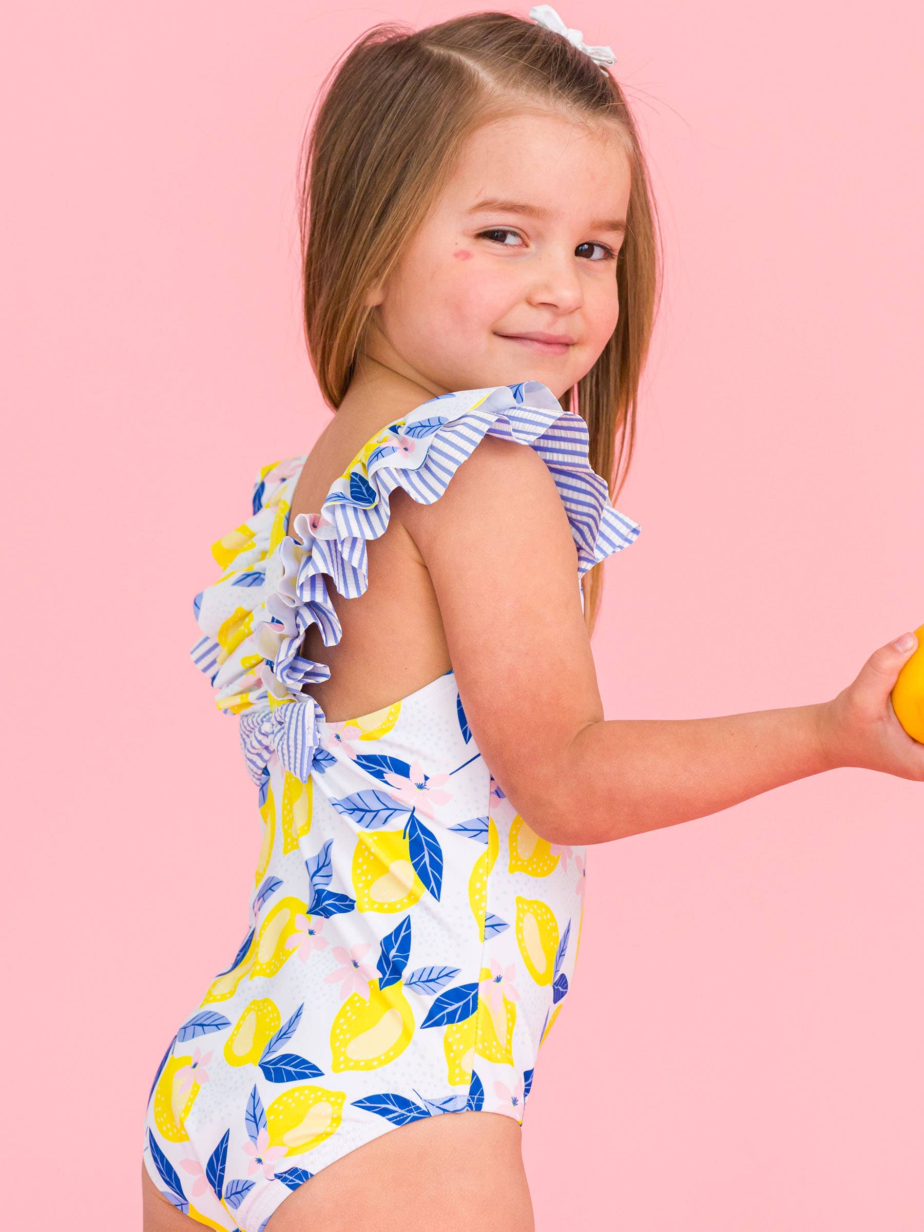 Yellow Girls Lemon Capri Bow V-Back One Piece Swimsuit
for wholesale on Faire