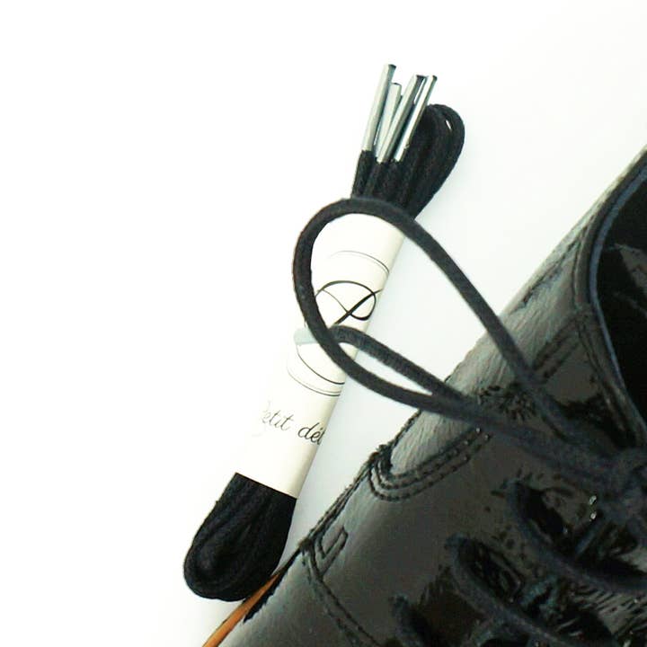 Lacci neri e argento in cotone cerato Made in France per la vendita all'ingrosso da parte di Petit détail