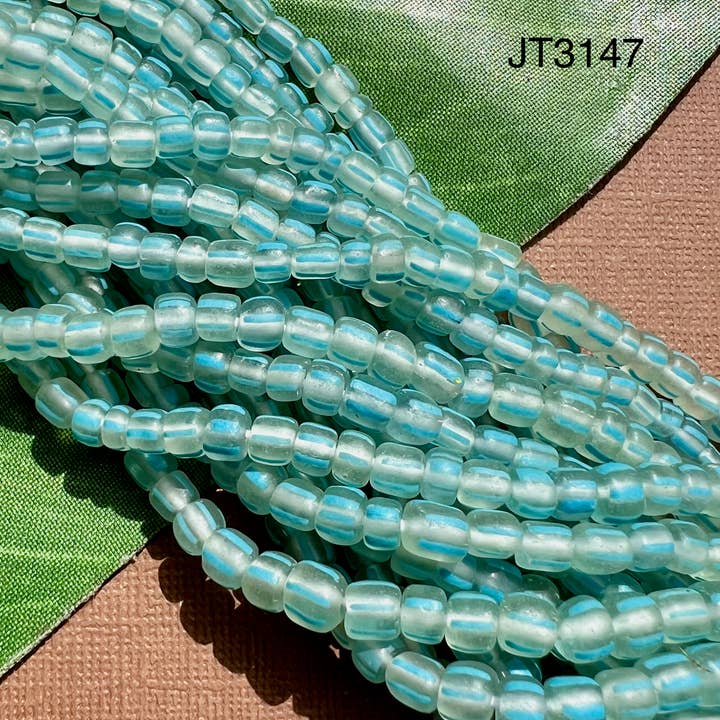 Perline indonesiane in vetro, a righe, colore: verde acqua, 5 fili per la vendita all'ingrosso da parte di Bead Goes On