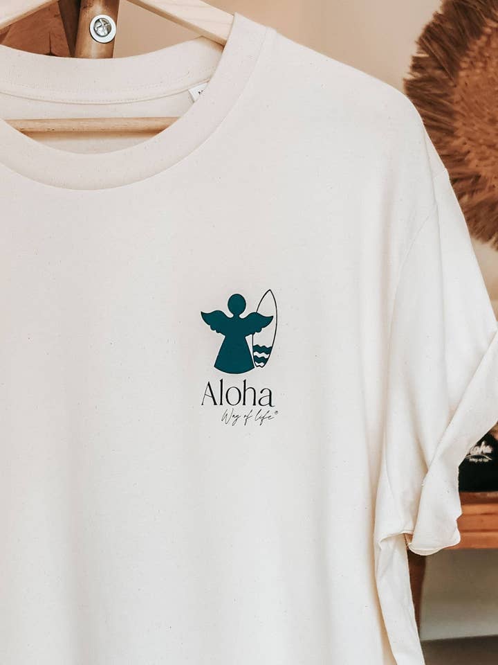 Camiseta 100 % algodón orgánico Ange Surfer, color ecru/natural sin teñir para venta al por mayor de ALOHA WAY OF LIFE