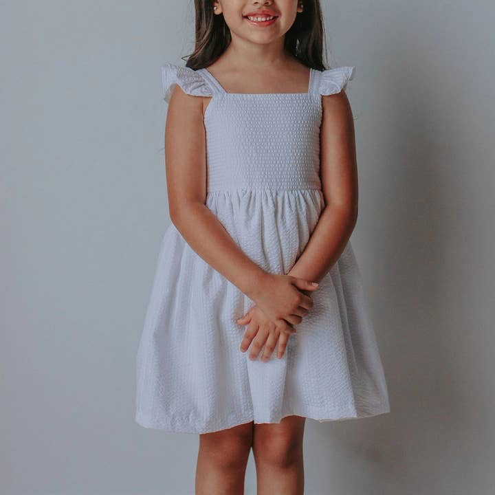 Little Girl's White Cotton Seersucker Dress for wholesale by cuteheads