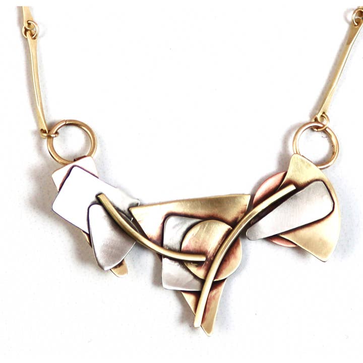 Abstractions Brass Necklace for wholesale by Whitney Designs Ltd.