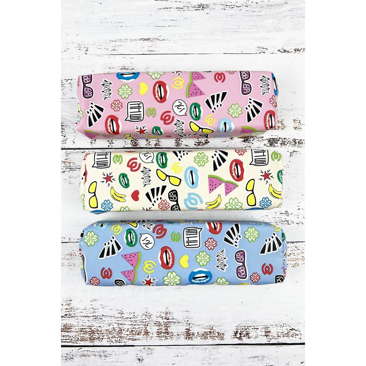 ASSORTED RECTANGLE SHAPED CUTE PRINTED COSMETIC POUCH for wholesale on Faire