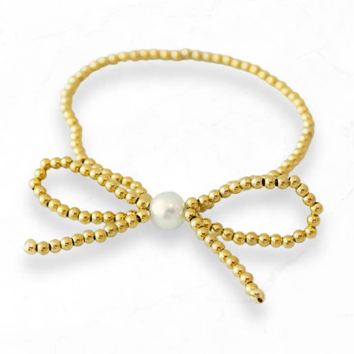 Bracciale con fiocco di perline dorate e perla per la vendita all'ingrosso da parte di Golden Thread