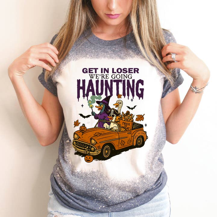 Get In Loser We're Going Haunting Bleached Halloween Tee for wholesale by Hello Gorgeous Apparel