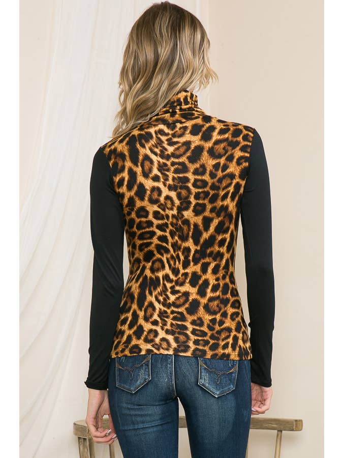 ANIMAL PRINT TURTLE NECK TOP WITH CONTRAST SLEEVES for wholesale on Faire6