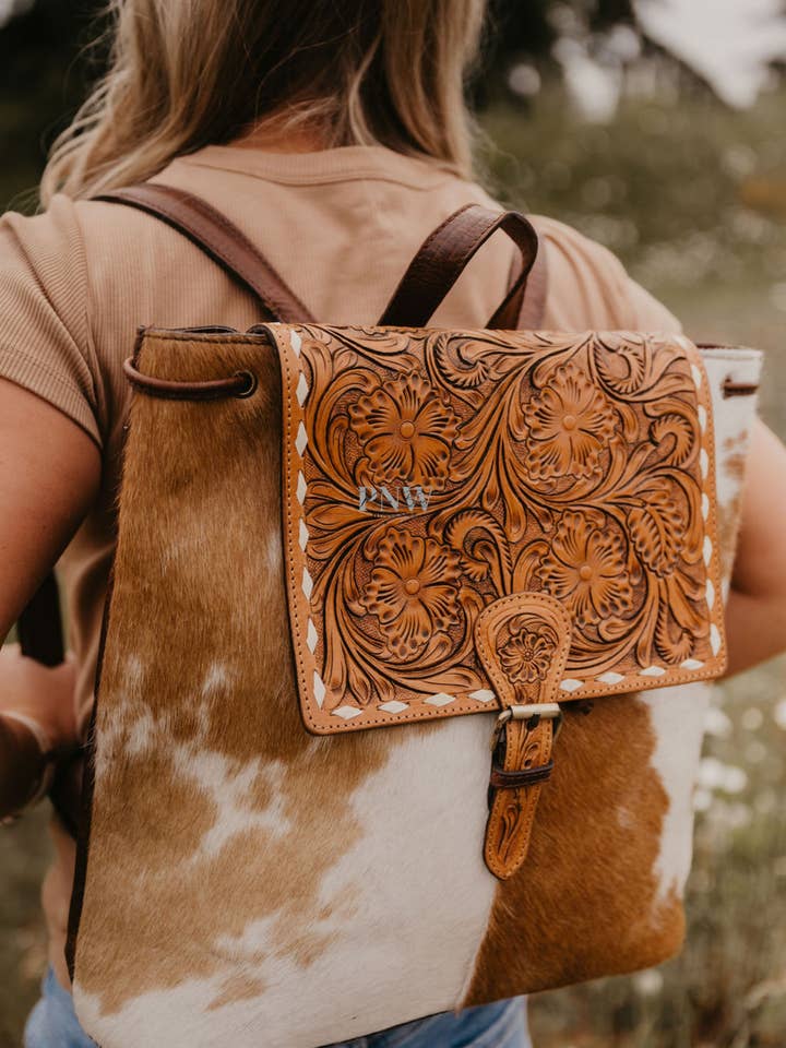 Rustic elegance cowhide backpack for wholesale by FRINGE & LUXE
