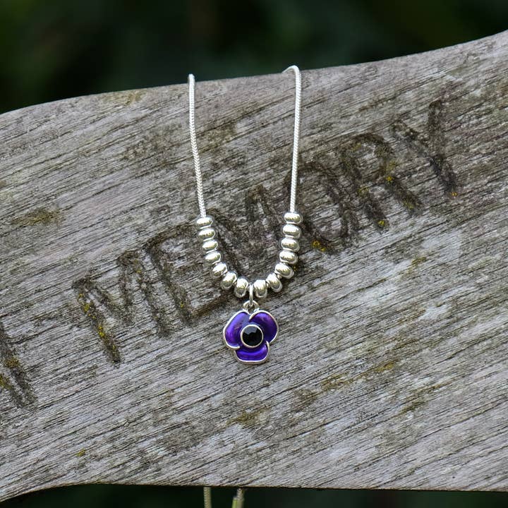 Poppy Purple Flower and Bead Pendant Necklace for wholesale by Alexander Thurlow & Co Ltd