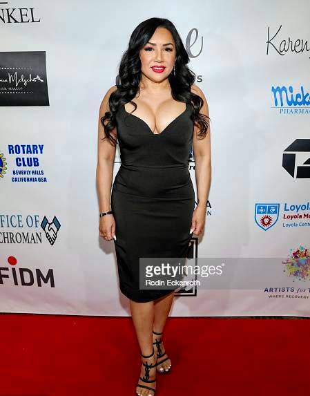 Homa Bow Back Dress: Satin sweetheart neck midi - black for wholesale on Faire1