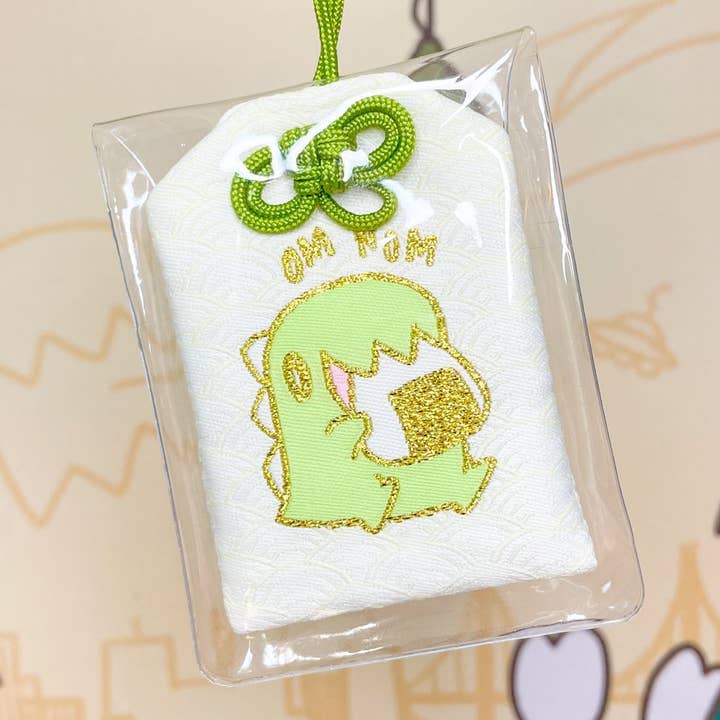 Feed Me Dino Omamori for wholesale by sakuradragon