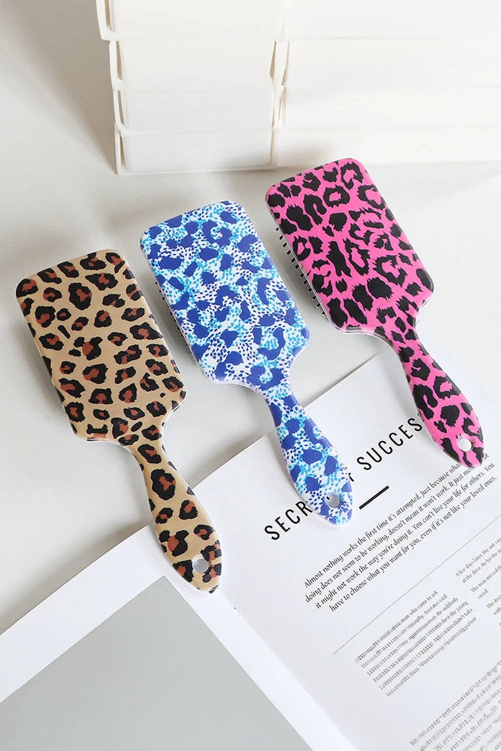 Camel Leopard Print Large Detangle Paddle Air Cushion Comb for wholesale on Faire2