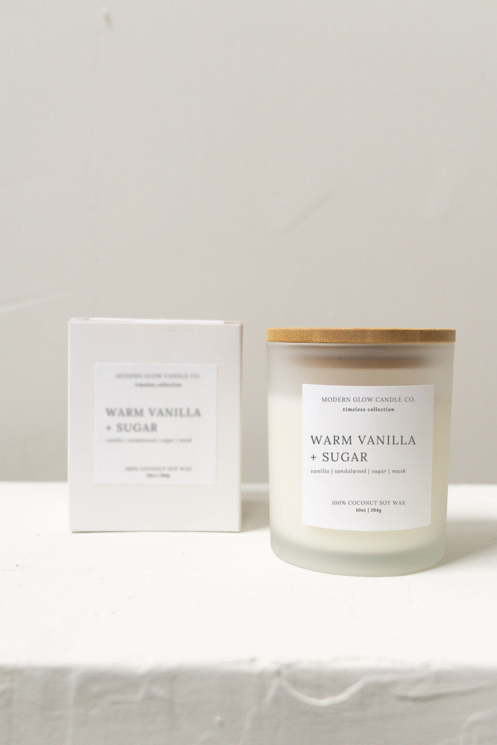 Modern Glow Candle Co. - Wholesale Jar/Filled Candle - Warm Vanilla + Sugar - 10oz Frosted White Soy Candle2