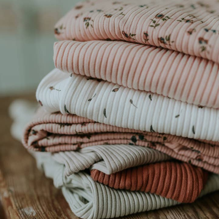 The Tank Onesie - Powder for wholesale by Lovely Littles