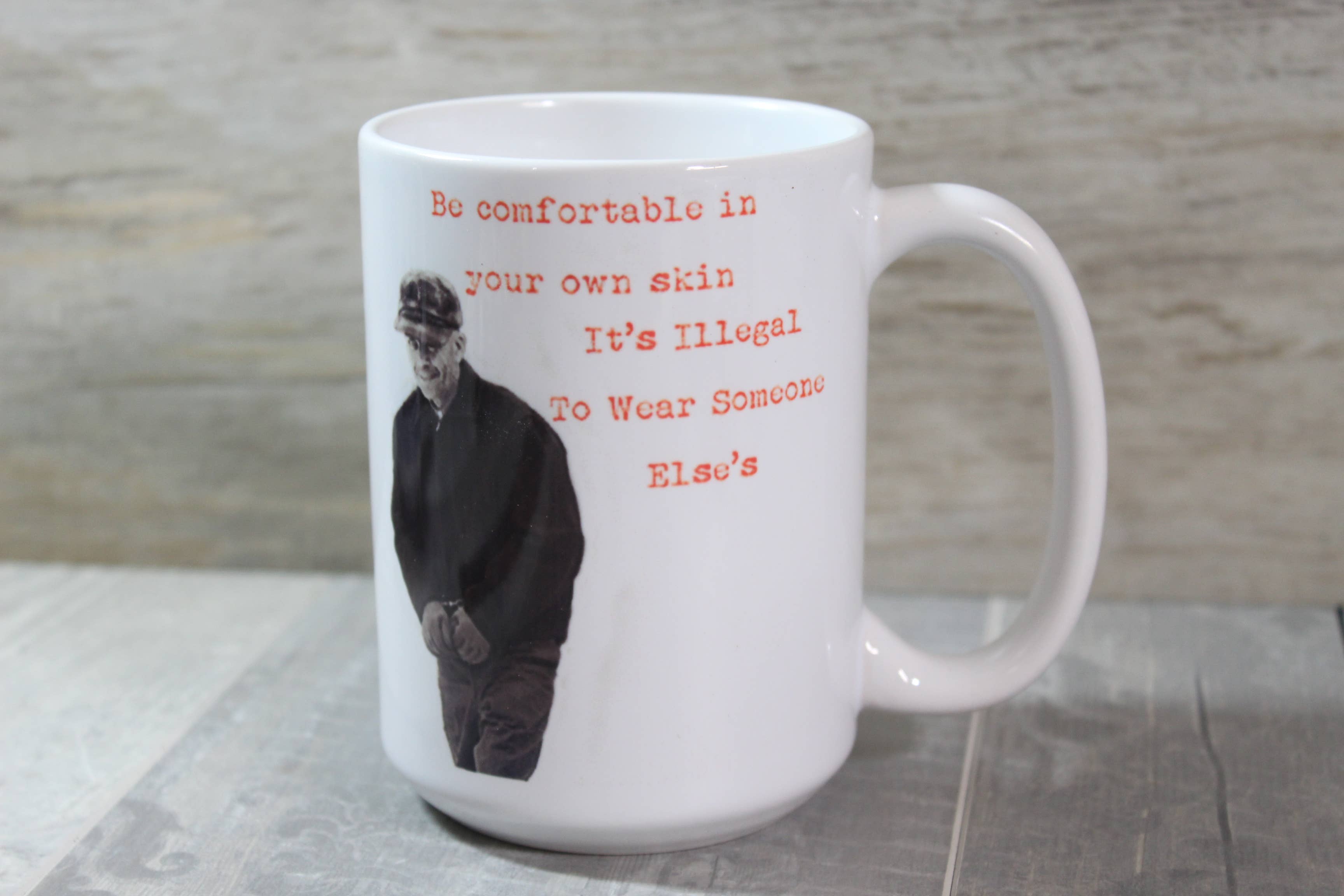 Raven Design - Wholesale Coffee Mug - Ed Gein- be comfortable in your own skin//15oz ceramic Mug1