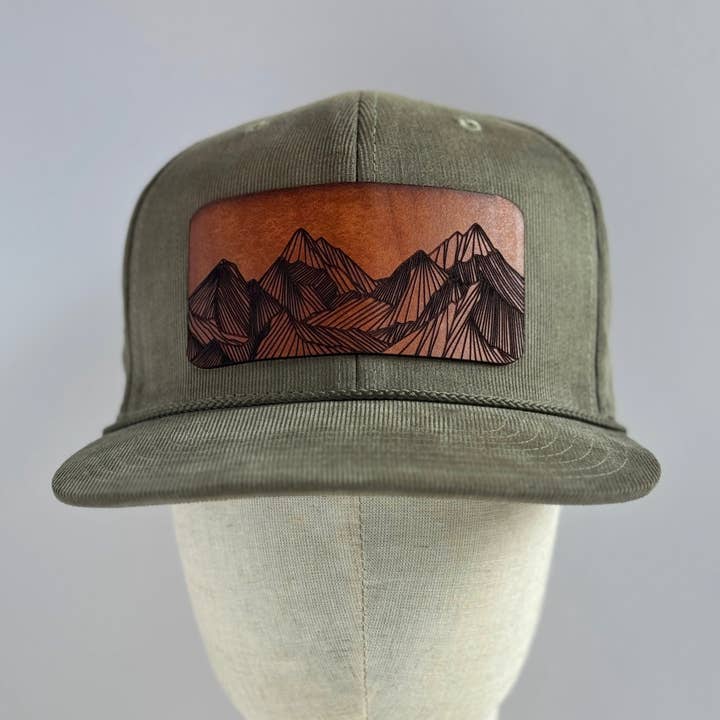The Lonely Pine - Wholesale Trucker Hat - Unisex - Many Peaks | mountain range leather patch hat1