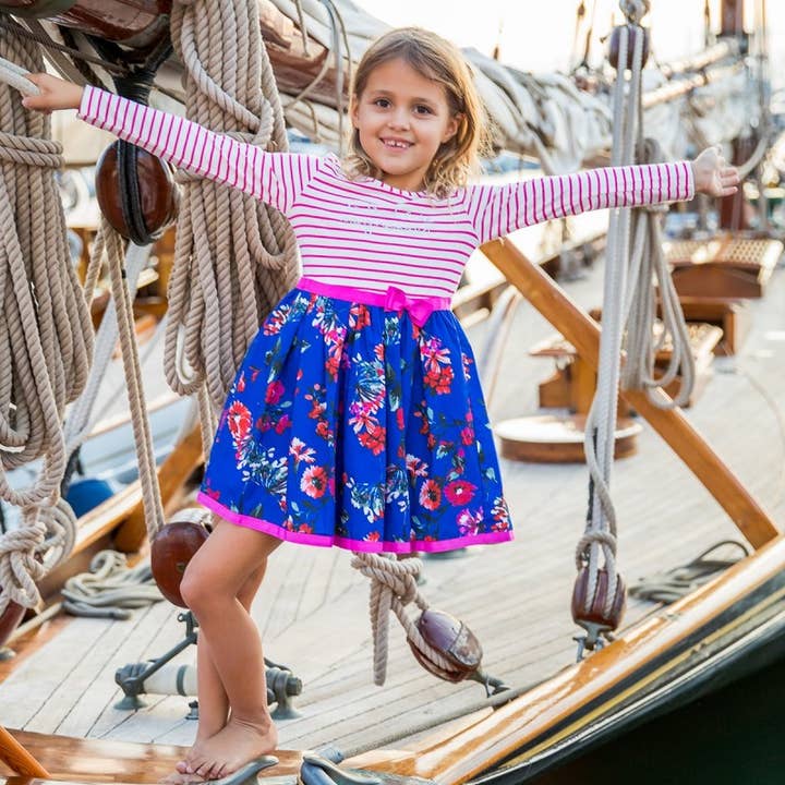 Langærmet kjole med blomstret flot nederdel, stribet overdel og sløjfe i taljen for engroshandel hos Interdit de me gronder