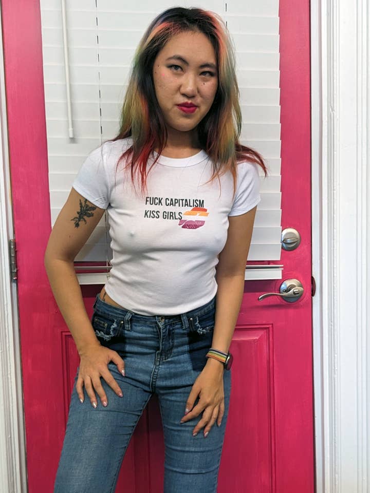 Fuck Capitalism, Kiss Girls Baby Tee for wholesale by Sapphic Space