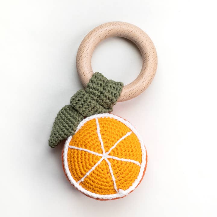 Orange Hand Crochet Baby Fruit Rattle for wholesale by Wonderjoys Baby Co